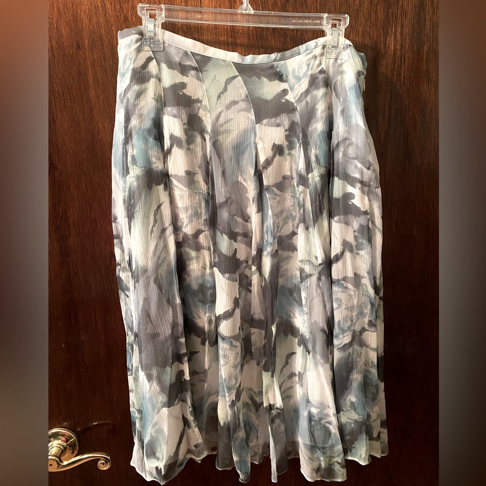 Skirt . Multi colored soft print in green gray cream and blue